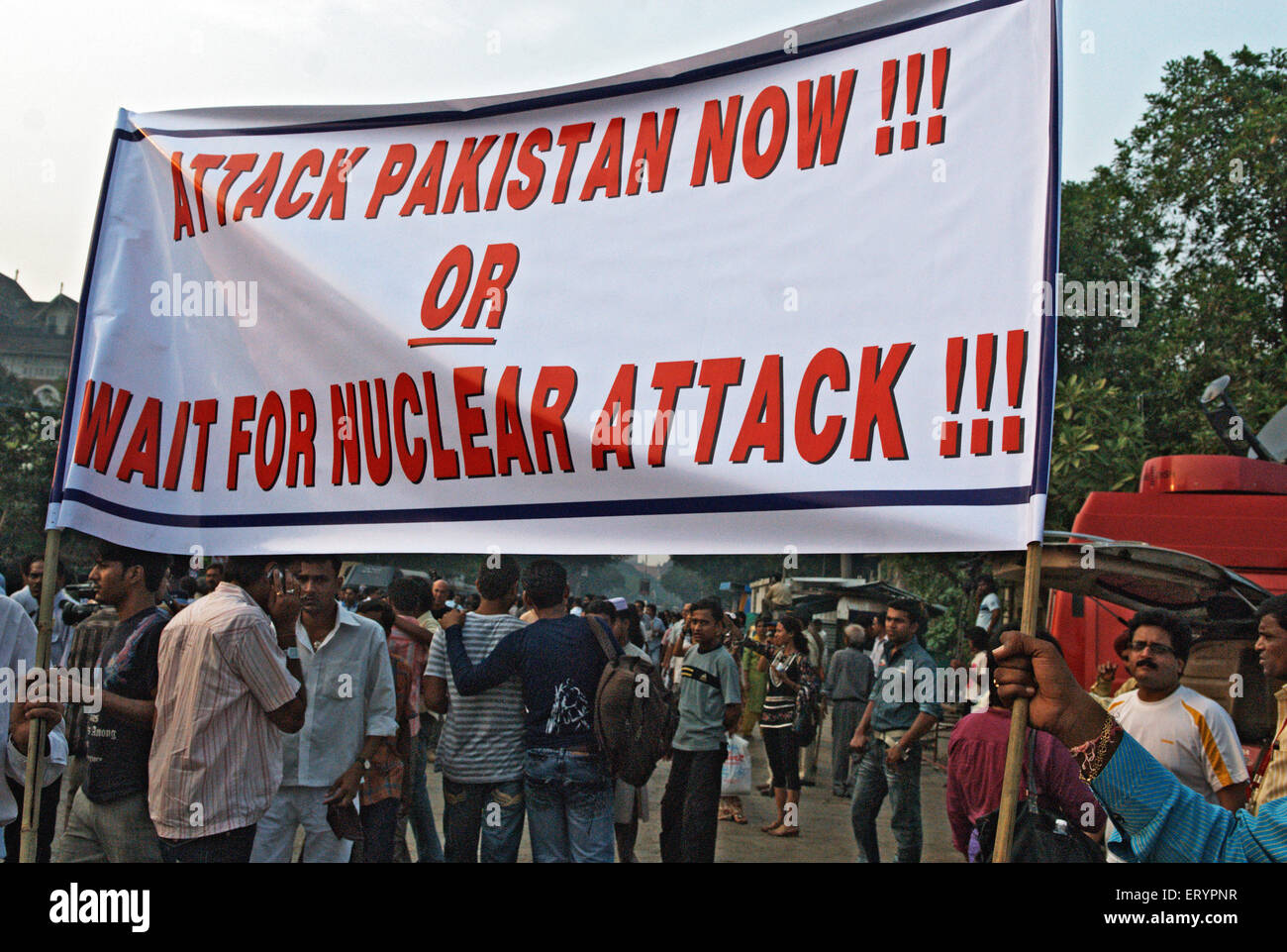 Protester holding banner after terrorist attack by deccan mujahedeen in Bombay Mumbai Stock Photo