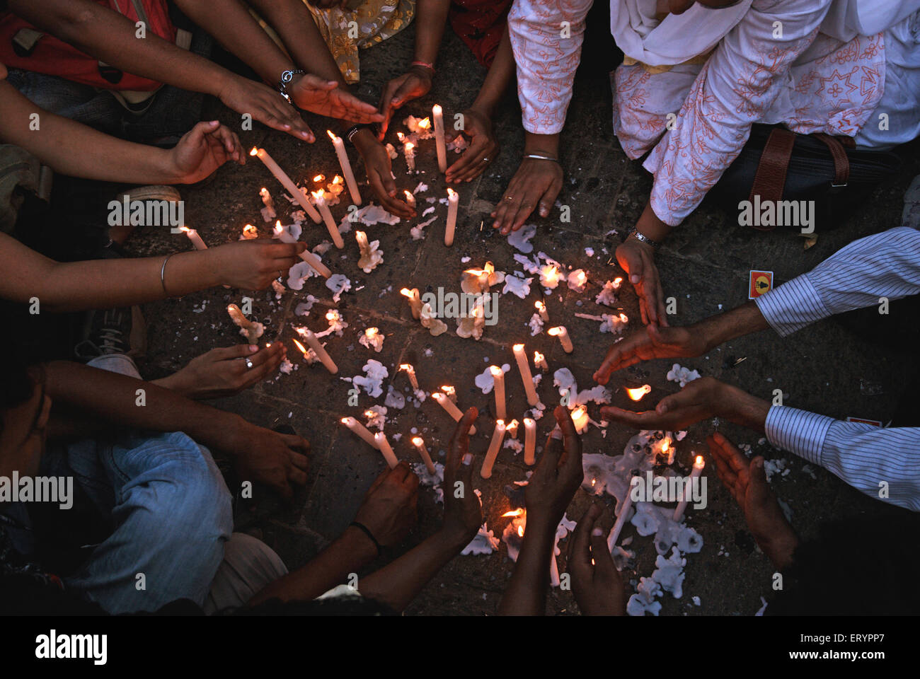 26/11 Mumbai terror attack 2008 , people lighting candles for victims , Bombay , Mumbai , Maharashtra , India , Asia Stock Photo