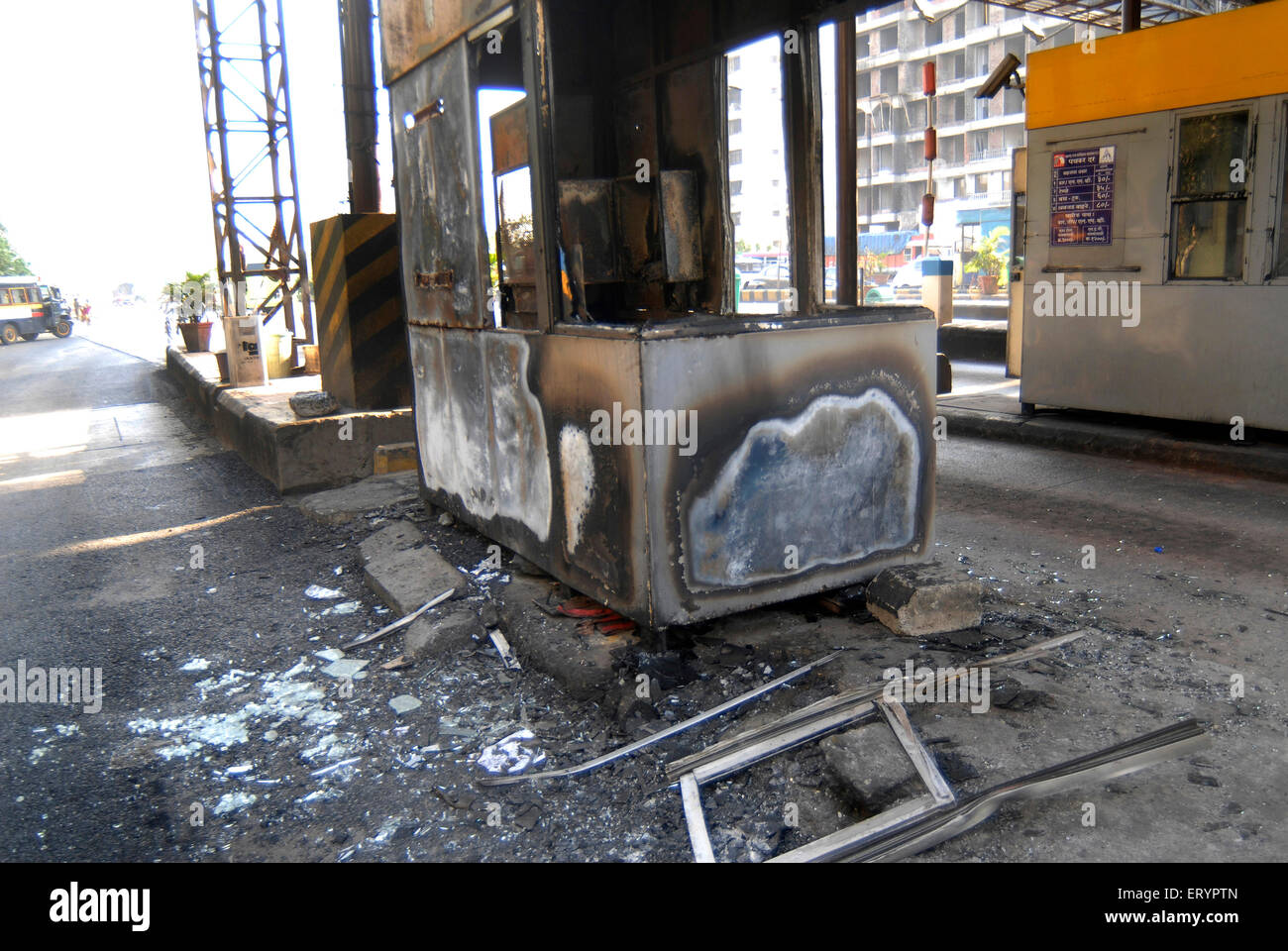 MNS Maharashtra Navnirman Sena activists burn down counter at toll naka at Mulund Bombay Mumbai Maharashtra India Stock Photo