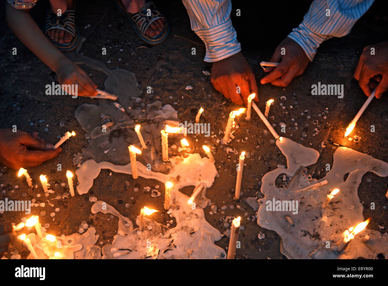 26/11 Mumbai terror attack 2008 , people lighting candles for victims , Bombay , Mumbai , Maharashtra , India , Asia Stock Photo