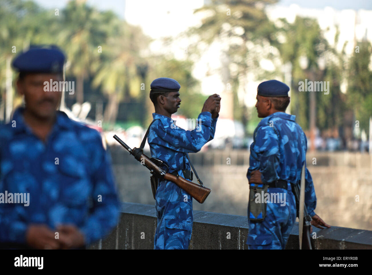 26/11 terror attack  , Rapid action force commandos taking photograph , Bombay , Mumbai , Maharashtra , India , Asia Stock Photo