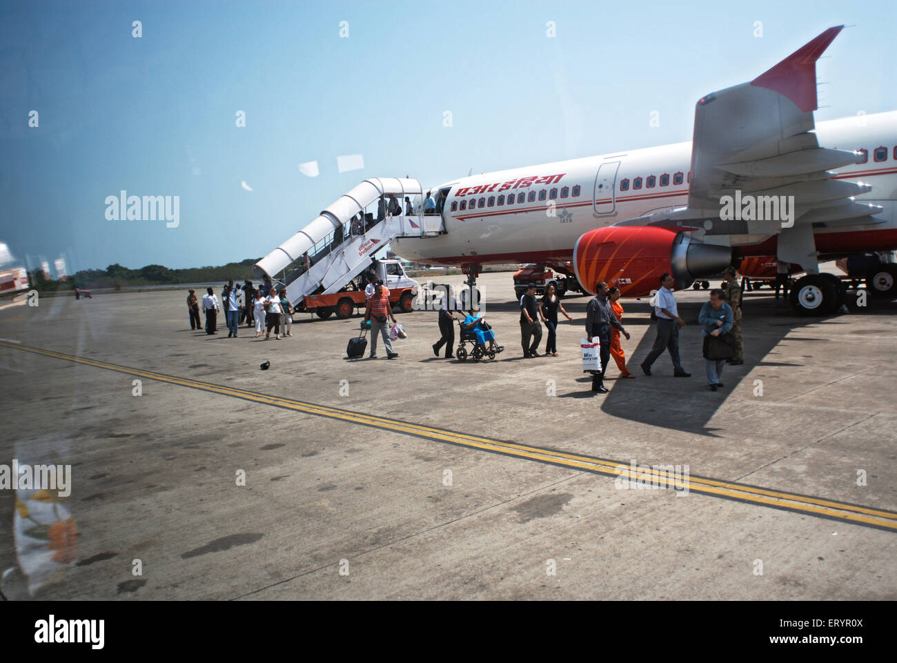 Passengers from air india flight at sahar or chhatrapati shivaji domestic airport ; Bombay Mumbai Stock Photo