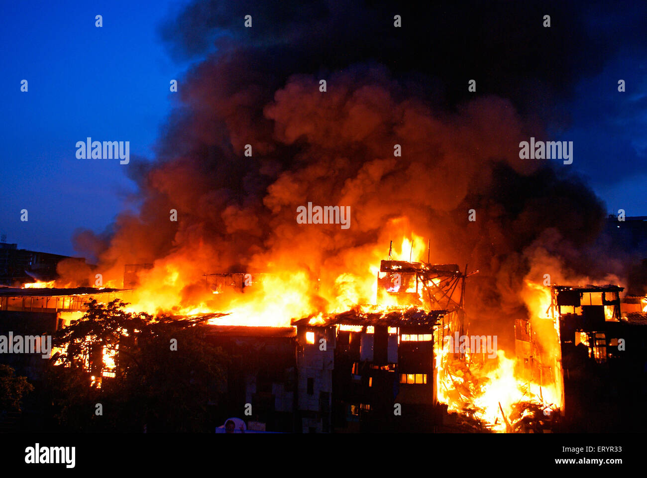 Fire in Behrampada slum ; Bandra ; Bombay Mumbai ; Maharashtra ; India 18 June 2009 Stock Photo