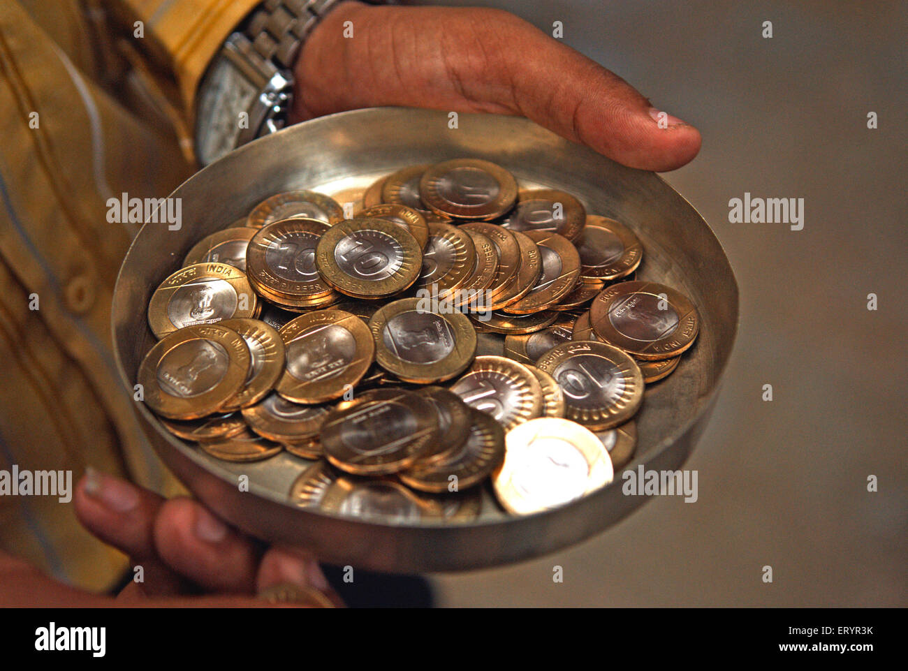 New ten rupees coins ; Bombay , Mumbai ; Maharashtra ; India , Asia Stock Photo