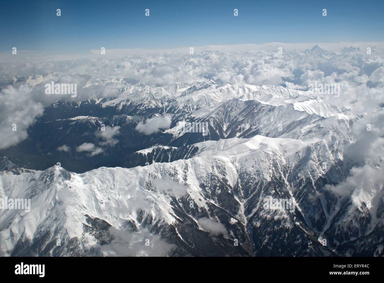 Aerial Himalaya snow capped peaks mountain range from aircraft , Delhi Srinagar flight , India , Asia Stock Photo