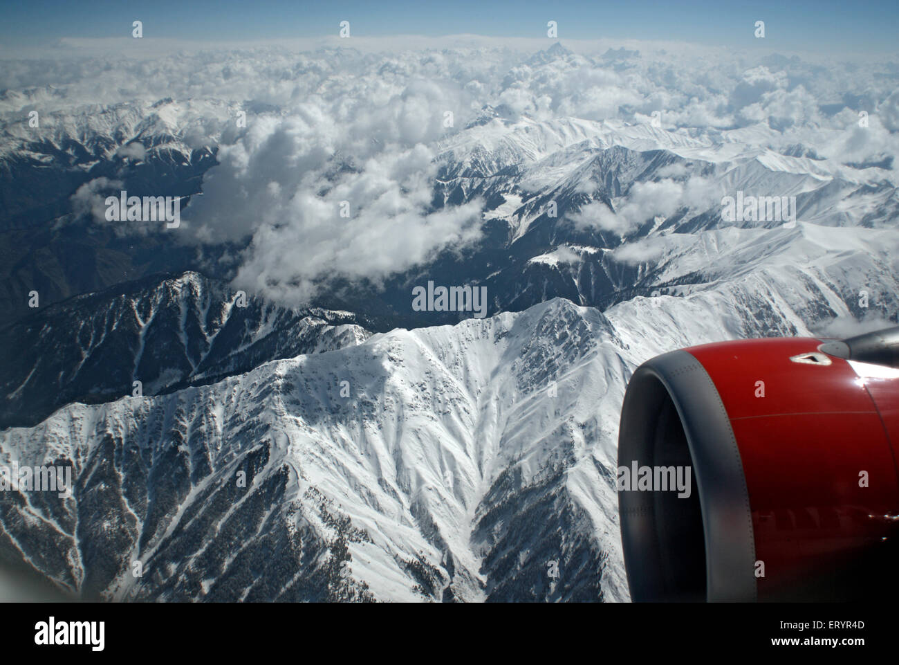 Aerial Himalaya snow capped peaks mountain range from aircraft , Delhi Srinagar flight , India , Asia Stock Photo