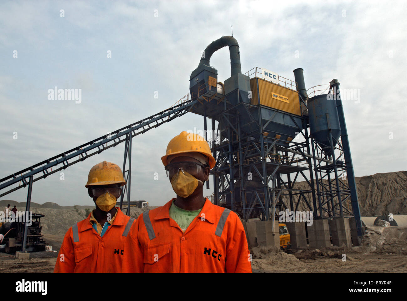 Workers in protective mask and glasses ; Madras ; Chennai ; Tamil Nadu ; India ; Asia Stock Photo