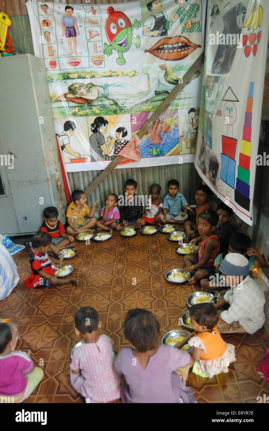Free midday meal , school children eating nutritious food , Bombay ,  Mumbai , Maharashtra , India , Asia Stock Photo