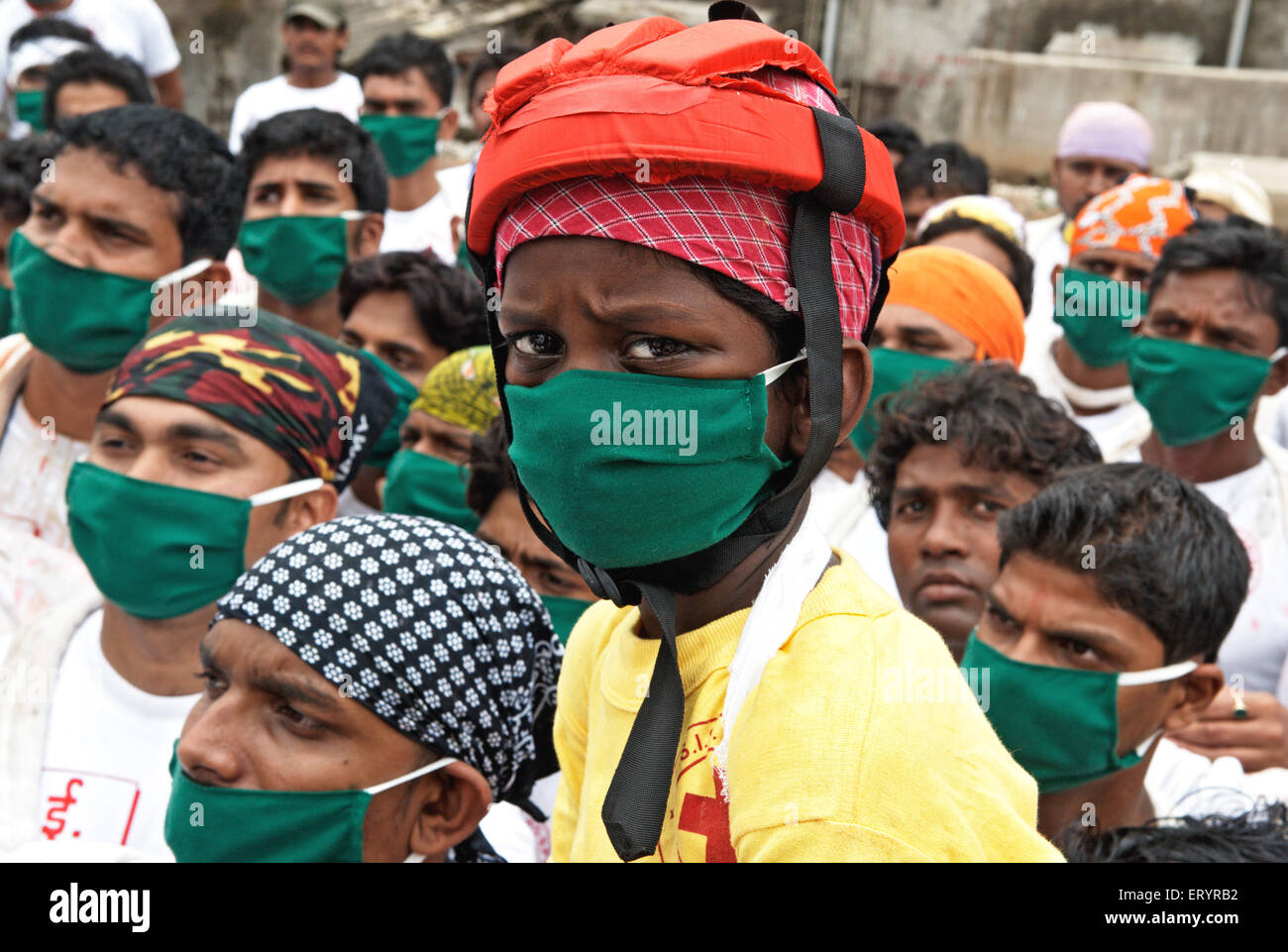 Boys wearing masks for protection from virus ; Bombay ; Mumbai ; Maharashtra ; India Stock Photo