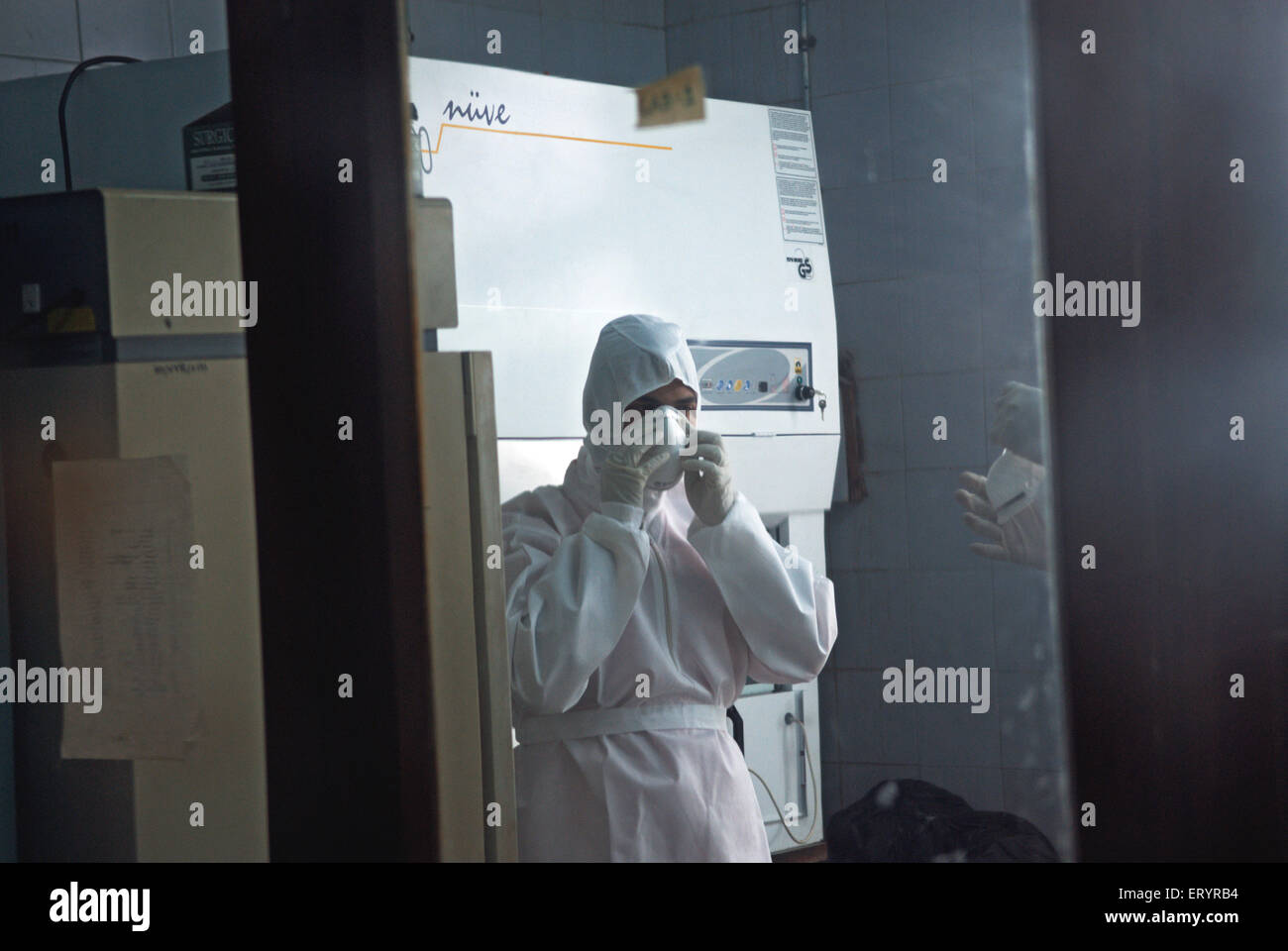 Scientist in protective gear in haffkine institute ; Bombay Mumbai ; Maharashtra ; India 15 August 2009 Stock Photo