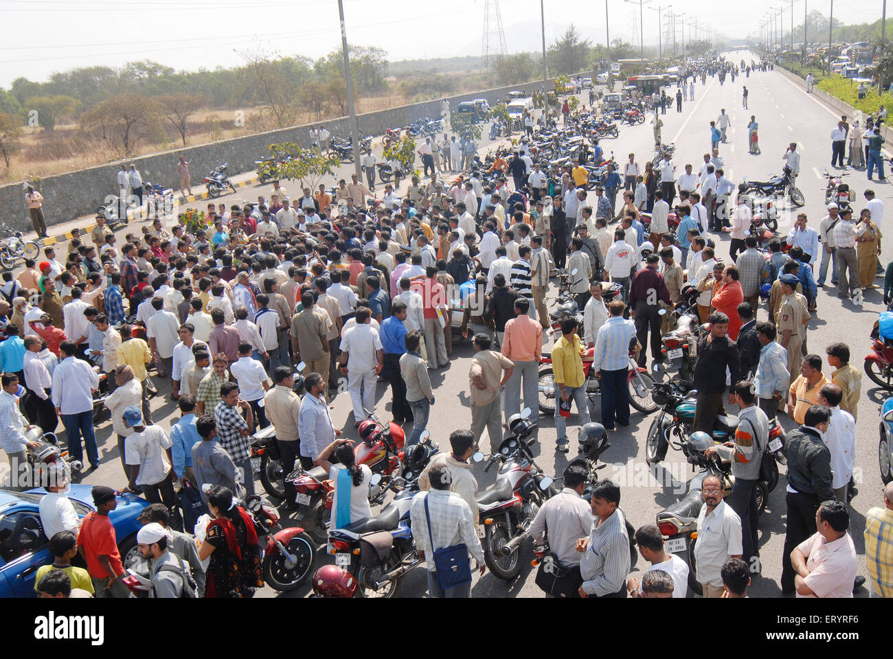 Bike accident , blocking road , Eastern Express Highway , Bombay , Mumbai , Maharashtra , India , Indian crowd , Asia Stock Photo