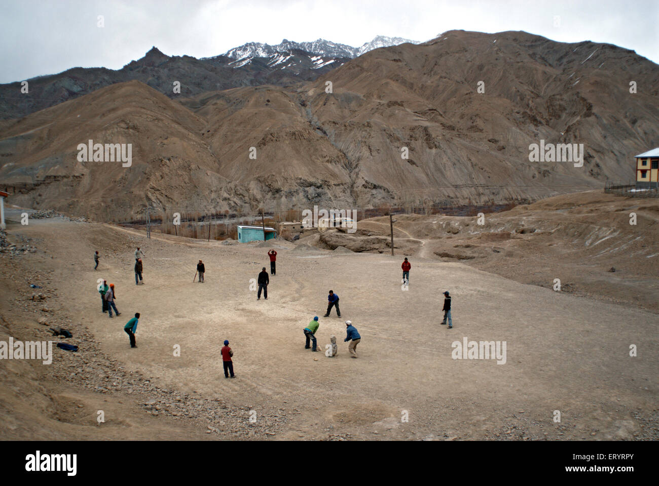 Boys playing cricket ; Wakha Wado village ; Kargil ; Leh ; Ladakh ; Jammu and Kashmir ; India 9 April 2008 Stock Photo