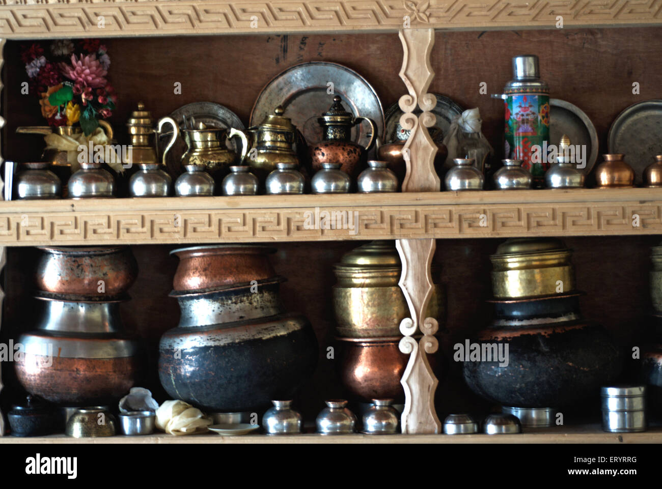 Kitchen utensils in wood cupboard , Leh , Ladakh , Jammu and Kashmir , India , Asia Stock Photo