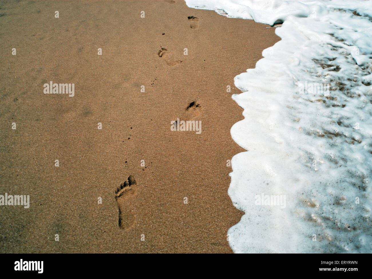 Footprints on sand , Anjuna Beach ; Goa ; India , Asia Stock Photo