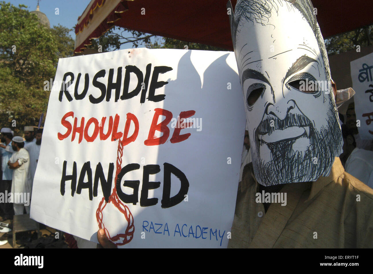 Salman Rushdie , Raza Academy Muslim Organization protest Rushdie Should Be Hanged mask , Bombay , Mumbai , Maharashtra , India , Indian writer , Asia Stock Photo