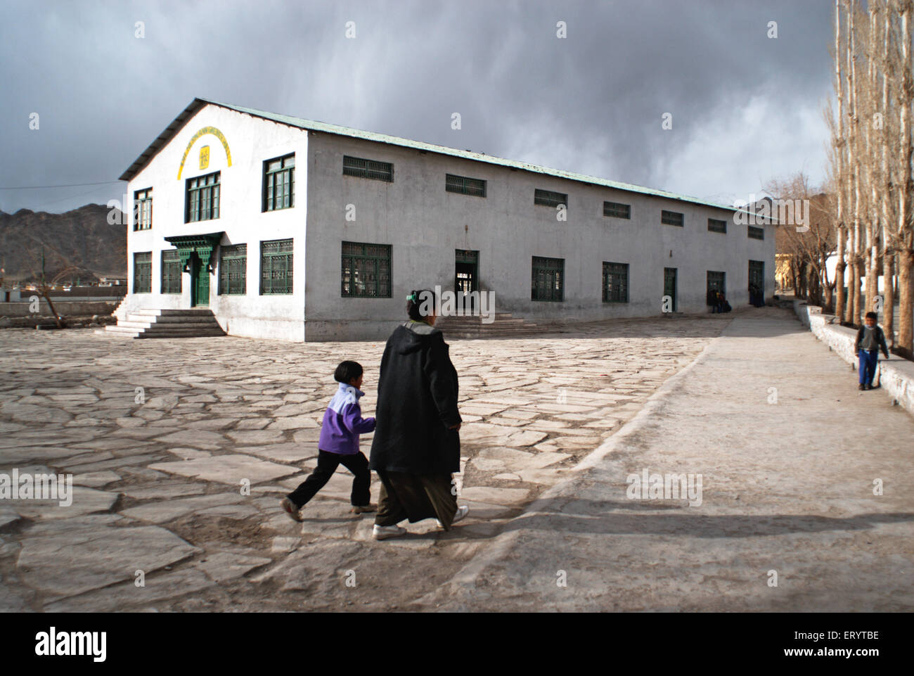 Lady with daughter at school ; Leh ; Ladakh ; Jammu and Kashmir ; India 11  April 2008 Stock Photo