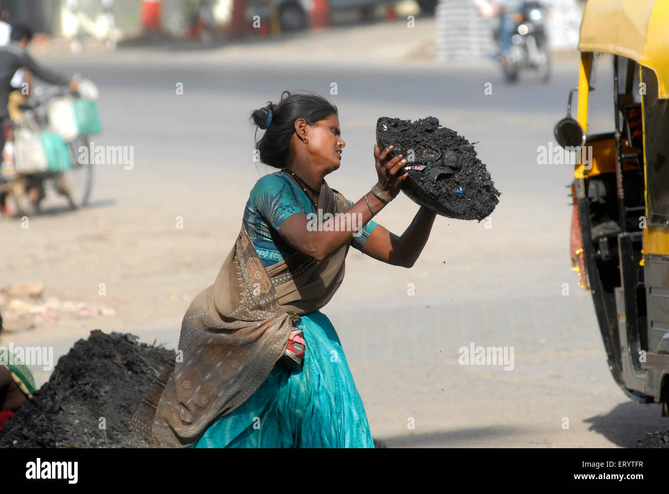 Women cleaning sewage, manual scavenging, Bombay, Mumbai, Maharashtra