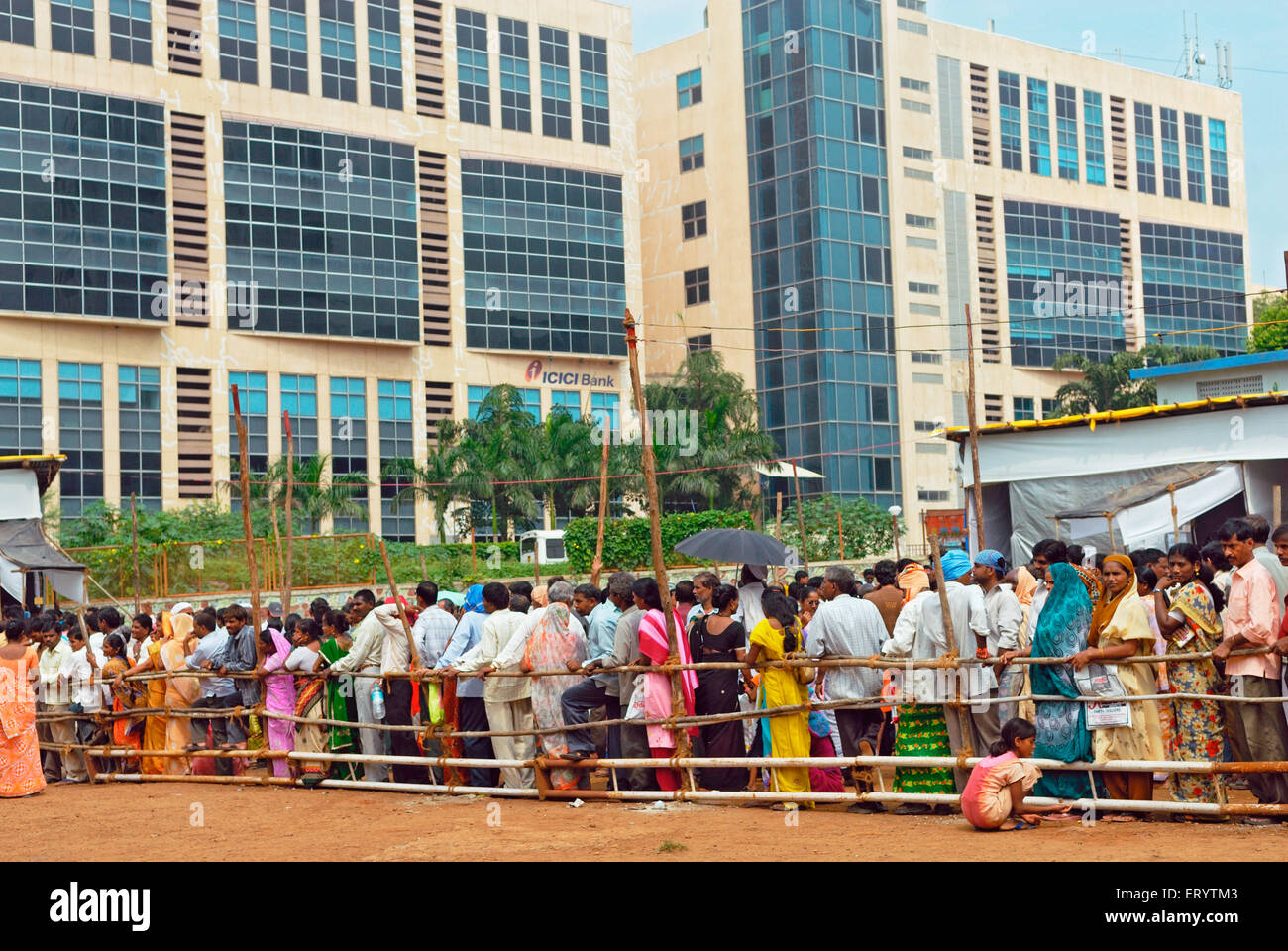 Voters standing in  queue to cast vote Bombay Mumbai ; Maharashtra ; India 13 10 2009 Stock Photo