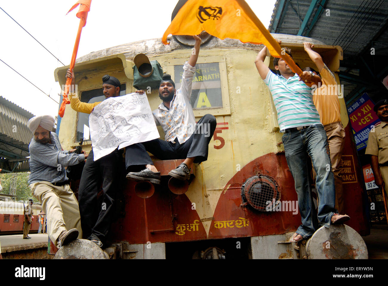 Sikhs blocking trains protesting for dera saccha sauda at ; Mulund ; Bombay ; Mumbai ; Maharashtra ; India NOMR Stock Photo