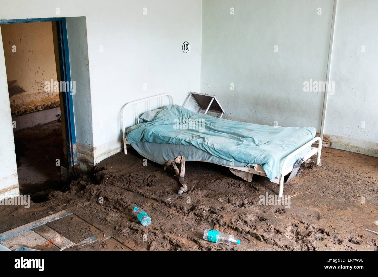 Flash flood damage , hospital bed in flash flood mud , Leh ; Ladakh ; Jammu and Kashmir ; India , Asia Stock Photo