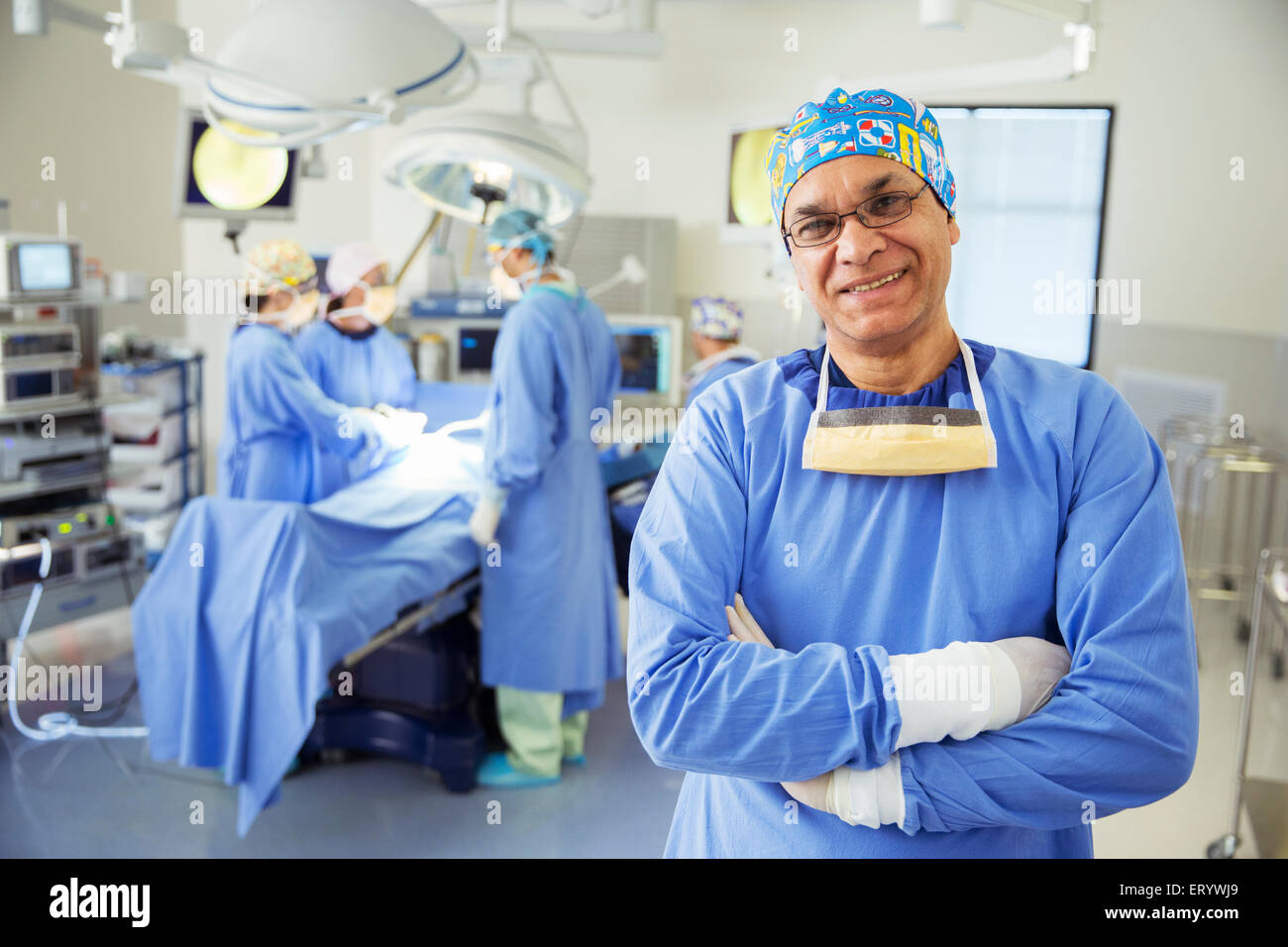 Portrait of confident surgeon in operating room Stock Photo - Alamy