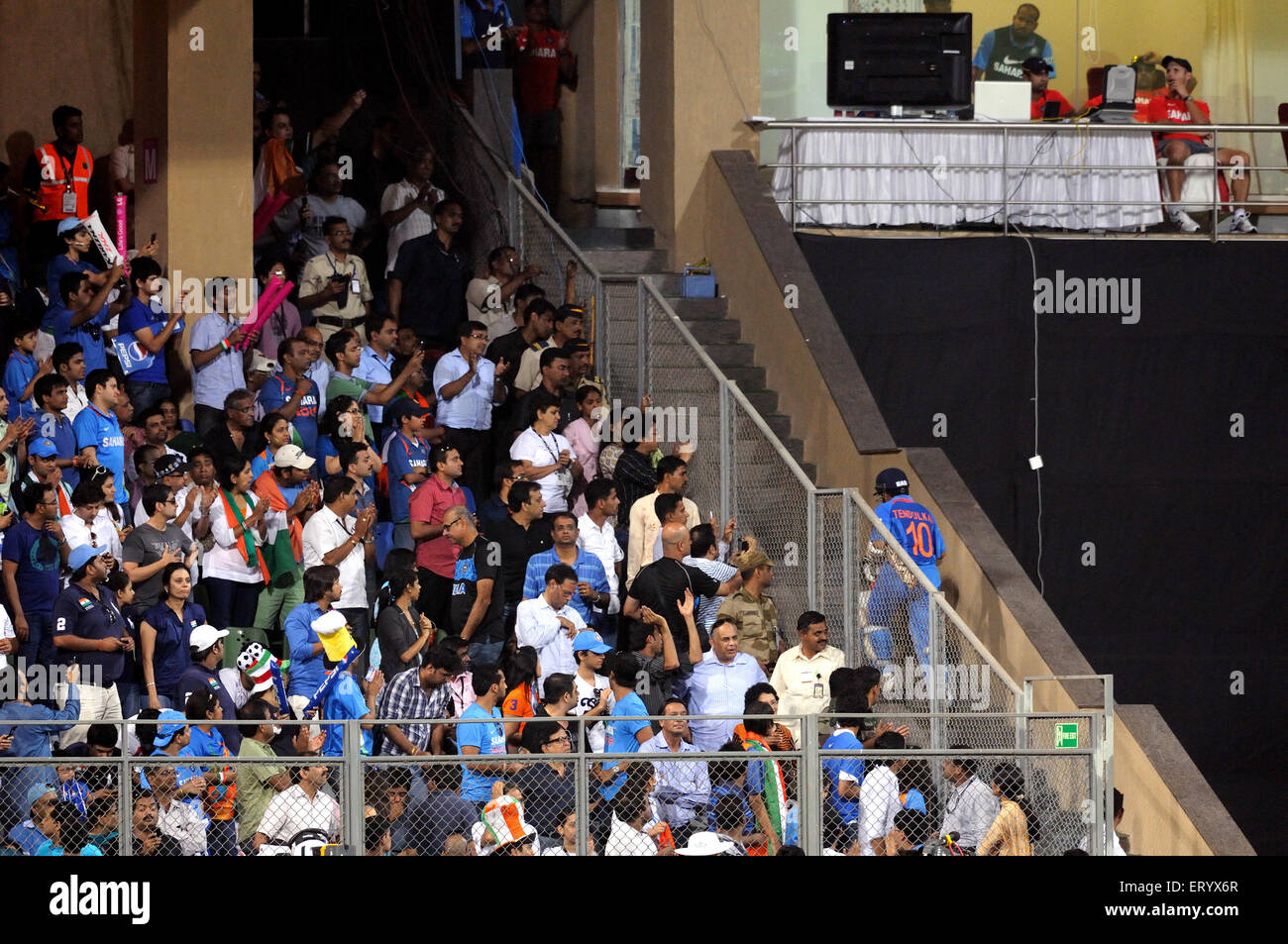 Cricket fans legendary batsman Sachin Tendulkar walking dressing room wicket 2011 ICC World Cup Final Wankhede Stadium Mumbai Stock Photo