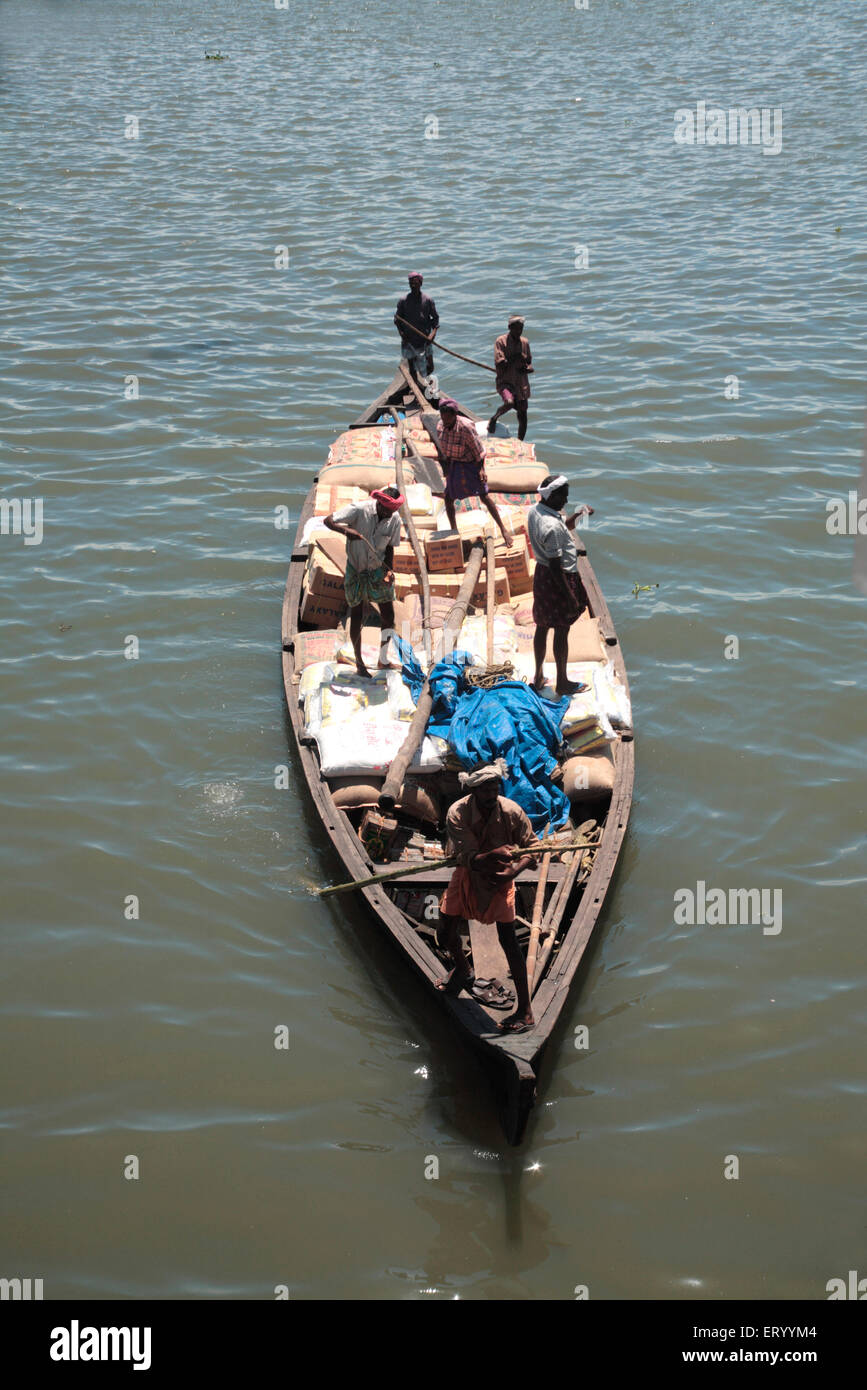 Boat carrying goods , Marine Drive , Cochin , Kochi , Kerala , India , Asia Stock Photo
