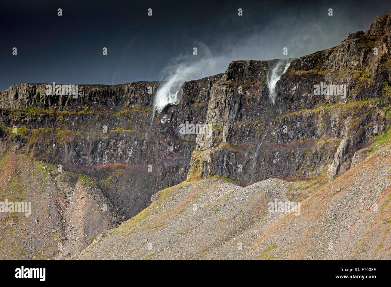 Water splashing over cliffs, Raudasandur, Iceland Stock Photo