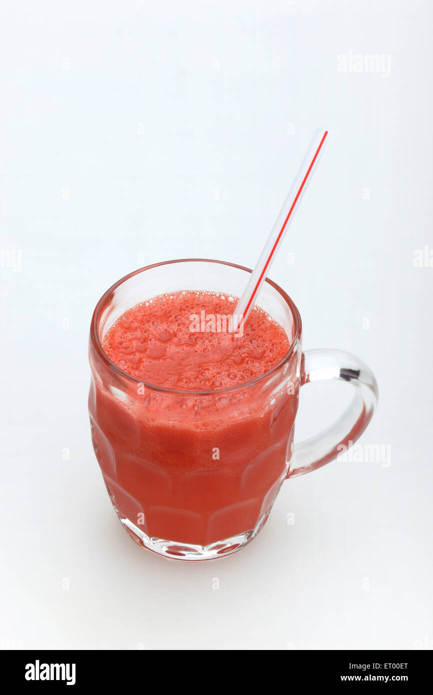Fruits ; Water Melon Latin Citrullus Lanatus juice in mug with straw Stock Photo
