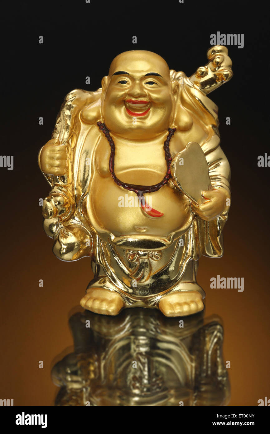 Golden laughing Buddha, good feng shui Stock Photo