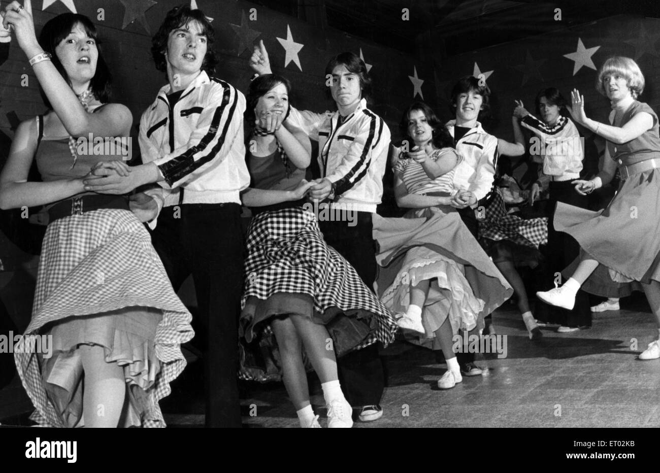 Good old fashioned rock n' roll is here to stay - and Drumchapel's New Generation Rock team are proof of that. For 16 youngsters from the Glasgow housing scheme's Argo Youth Centre have formed a rock n' roll jive formation team, let by Trudi Danks (pictured on the right) And now they've made such a hit that they are being lined up for a spot on BBC TV's multi coloured Swap Shop.  Last night the team - Elizabeth Clark, 14, Jim Smith, 15, Julie Fox, 15, Janus Wards, 16, Wendy Danks, 15 and David Clark, 16 - were busy rehearsing.  15th November 1977. Stock Photo