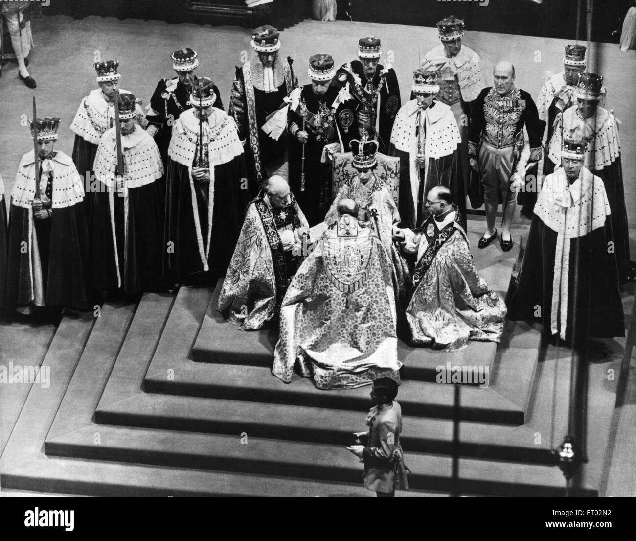 The Coronation of Queen Elizabeth II was the ceremony in which the newly ascended monarch, Elizabeth II, was crowned Queen of the United Kingdom, Canada, Australia, New Zealand, South Africa, Ceylon, and Pakistan, as well as taking on the role of Head of Stock Photo