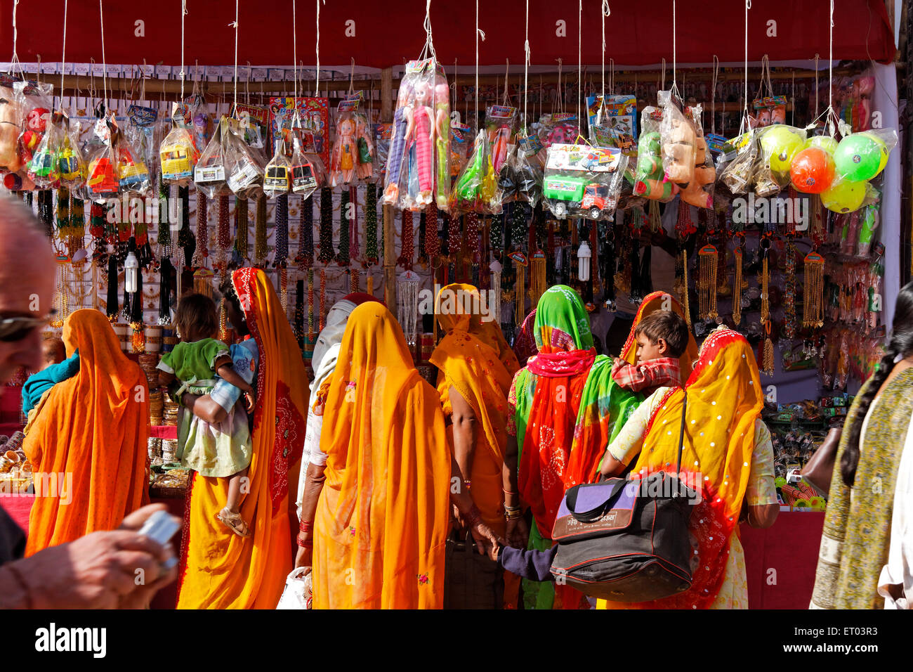 Women at stall ; Pushkar Mela ; Rajasthan ; India Stock Photo
