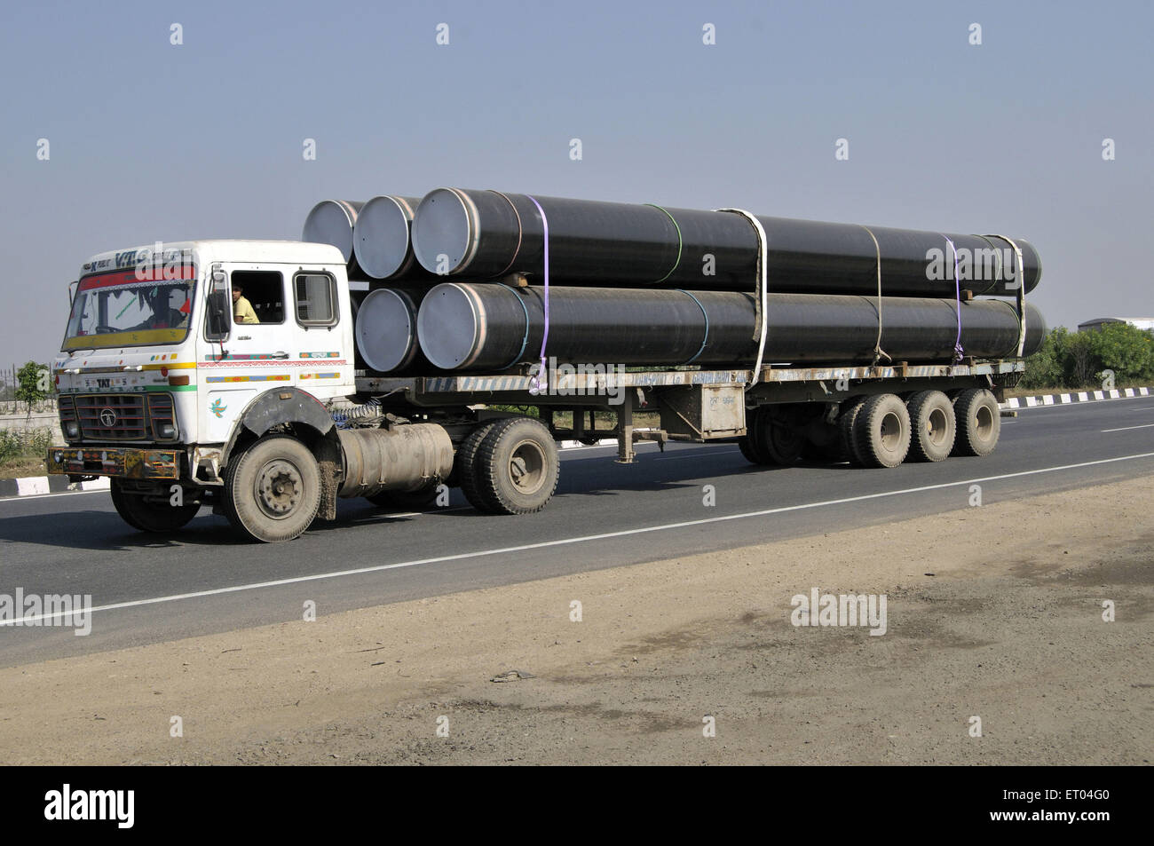 Long truck carrying pipes at Delhi India Stock Photo 83596800 Alamy
