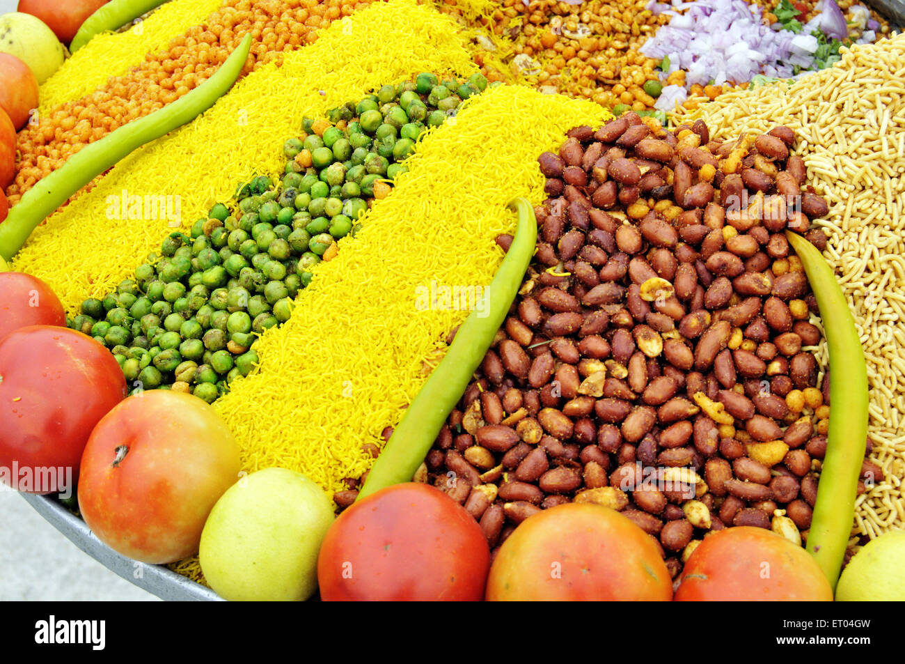 Ingredients of Indian snack bhel on road in Jaipur at Rajasthan India Stock Photo