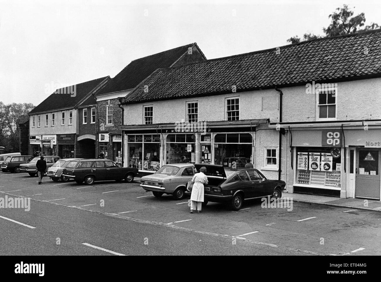 Shopping in Great Ayton, North Yorkshire, and the region's villages can be pleasant and leisurely compared to the bustle and parking problems of the town. 27th May 1976. Stock Photo