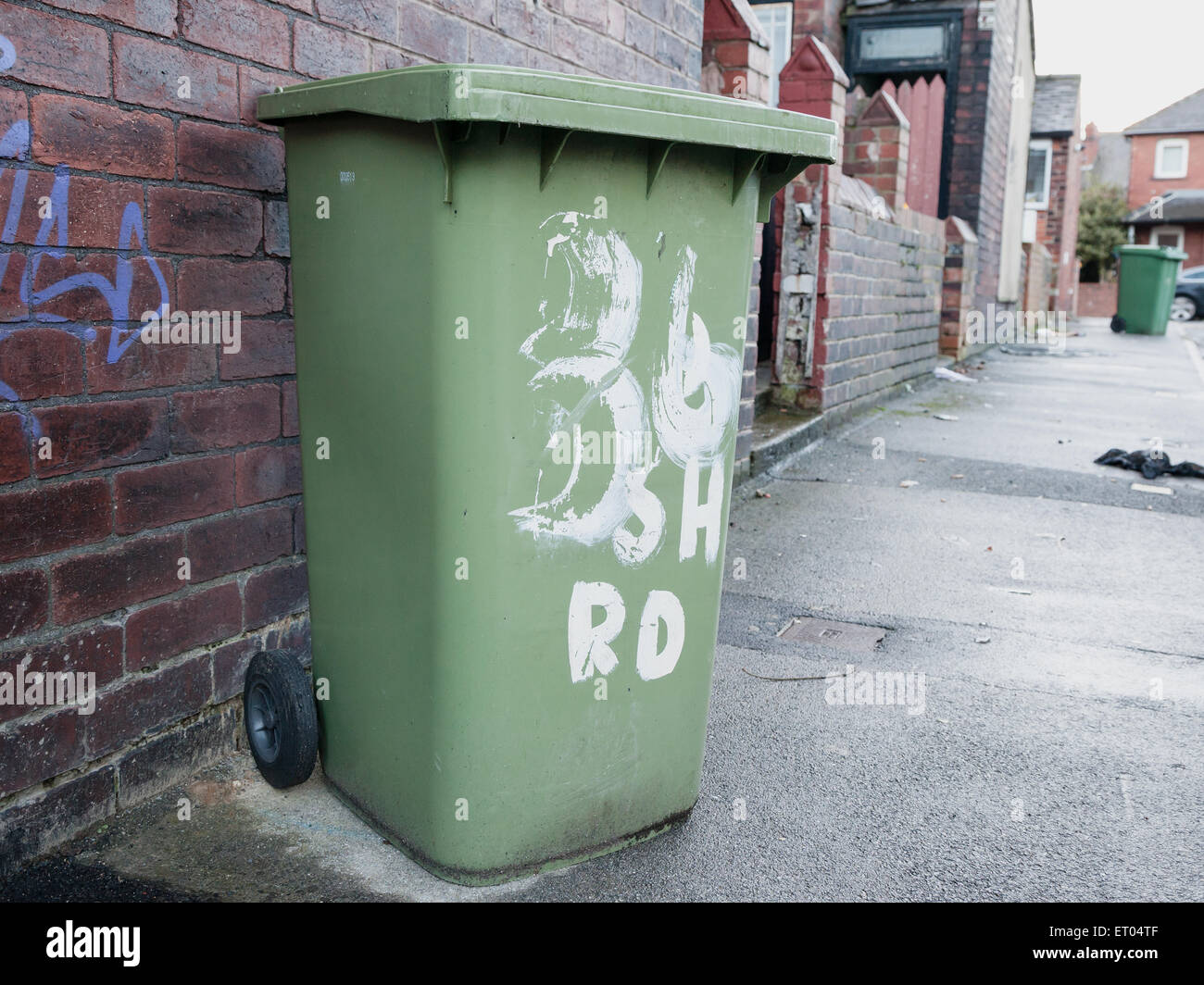 A bin on a street in the Hyde Park area of Leeds, England Stock Photo