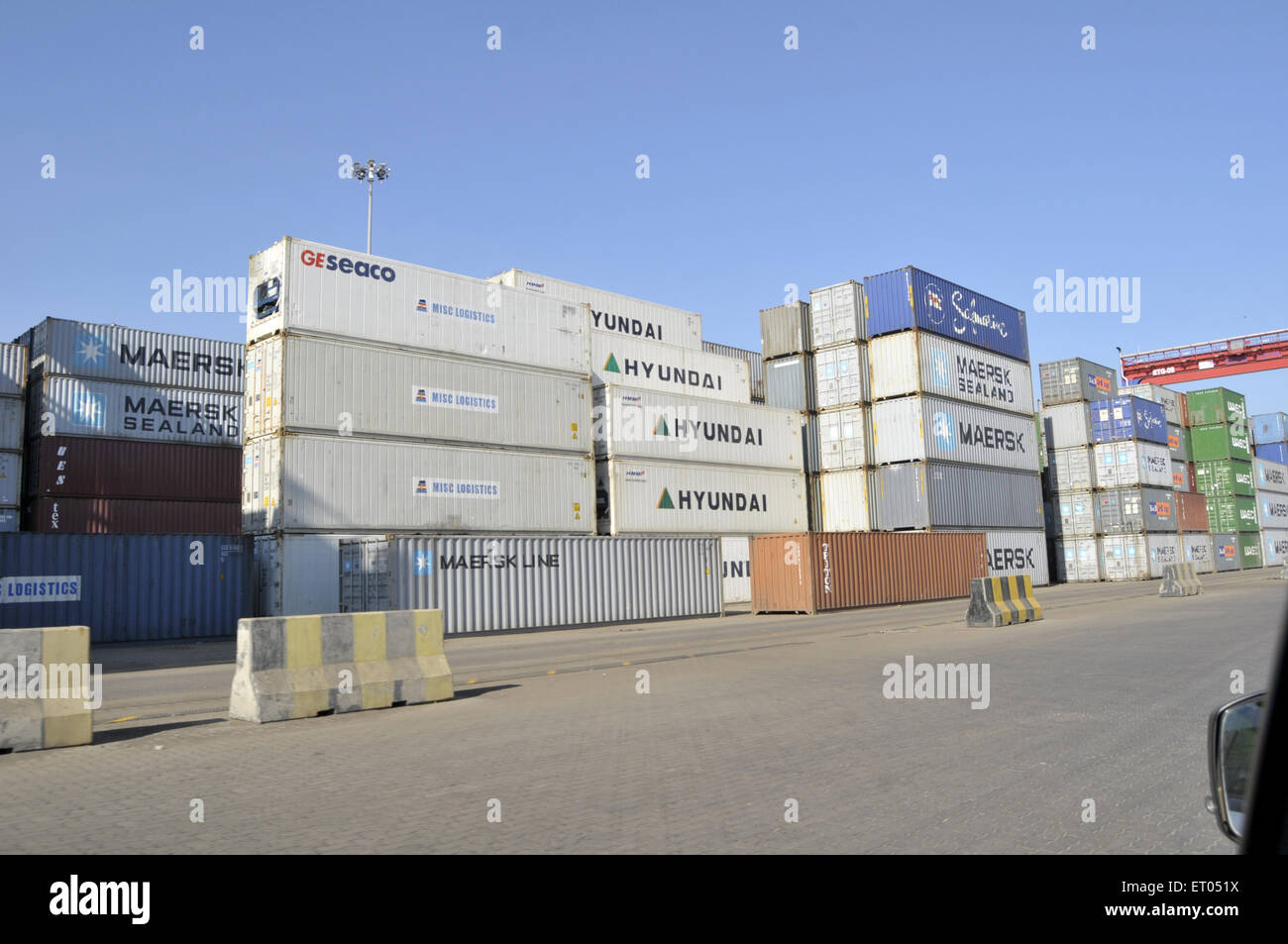 Cargo Containers ready to be loaded on ships in pipavav port at Gujarat India Stock Photo