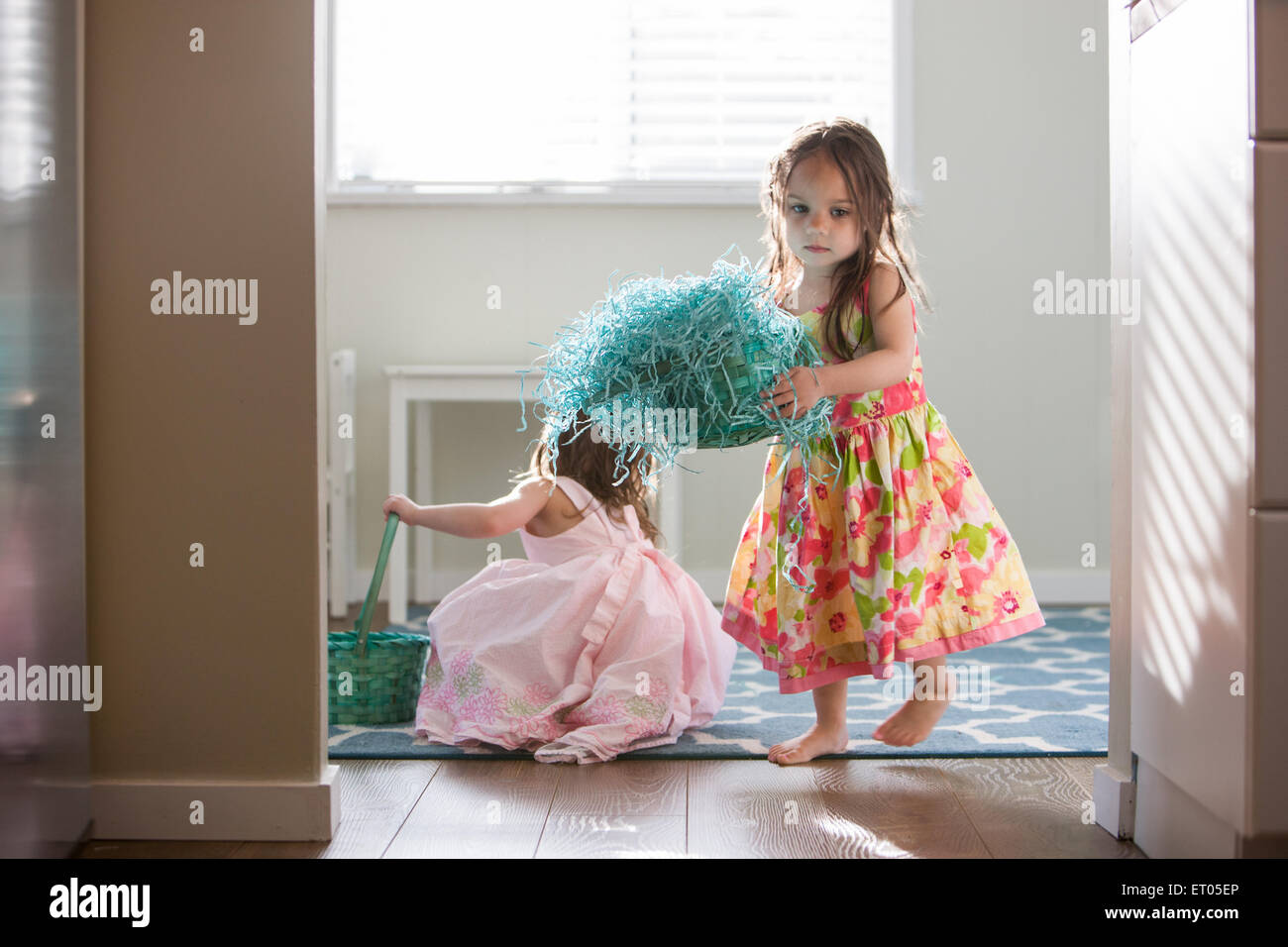 Girls in dresses with Easter baskets Stock Photo