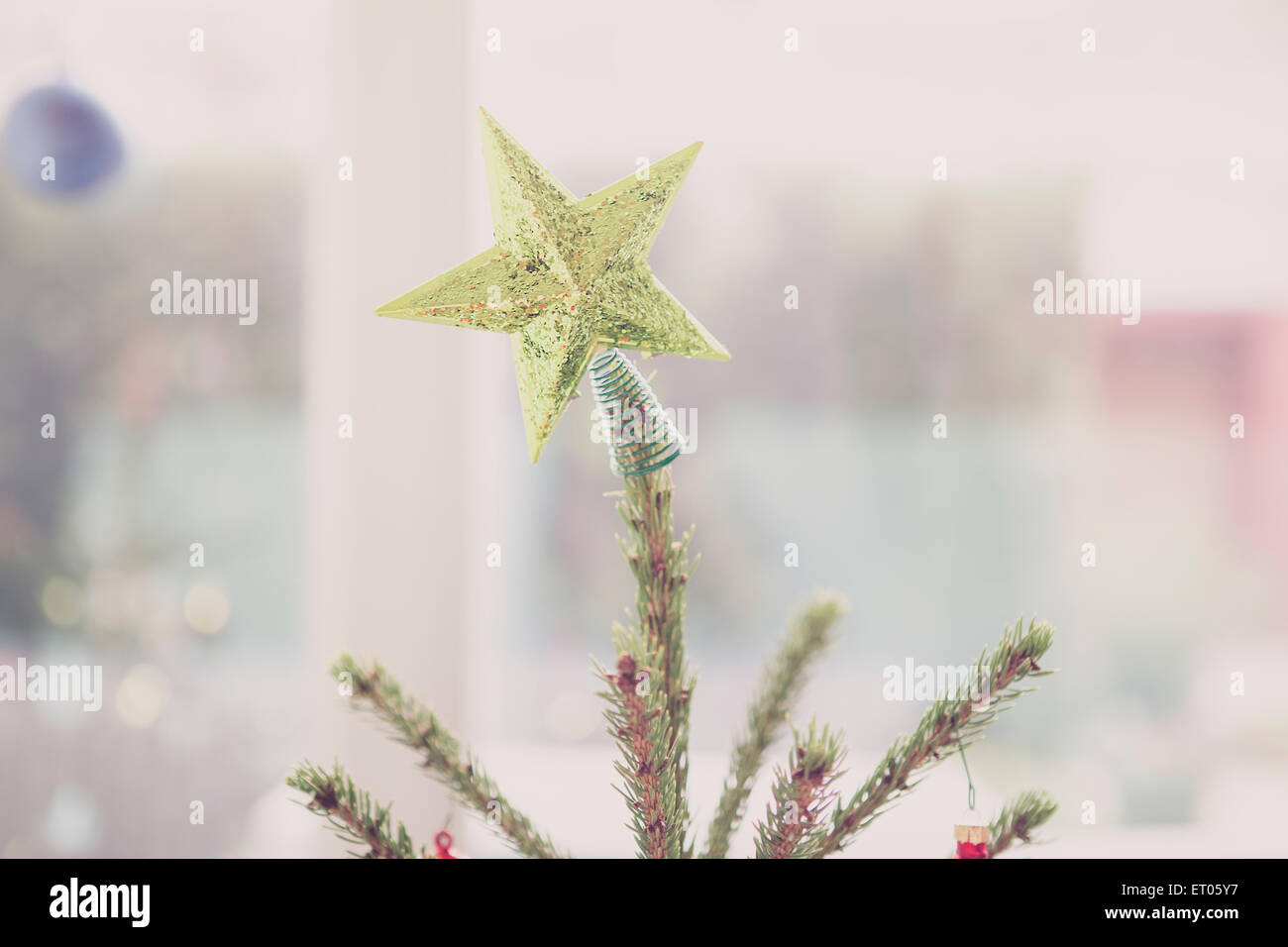 Golden star Christmas tree topper Stock Photo