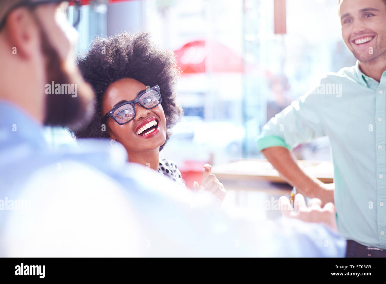 Laughing businesswoman in meeting Stock Photo