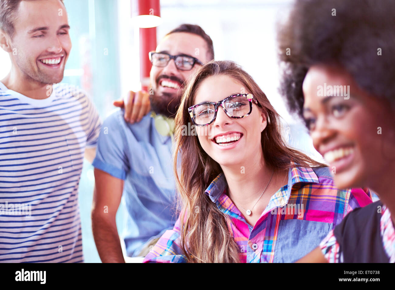 Friends smiling and laughing Stock Photo