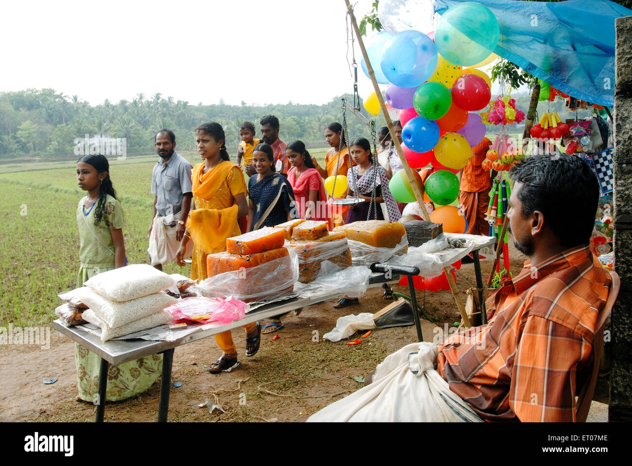 Halwa and balloon shop ; Kerala ; India Stock Photo