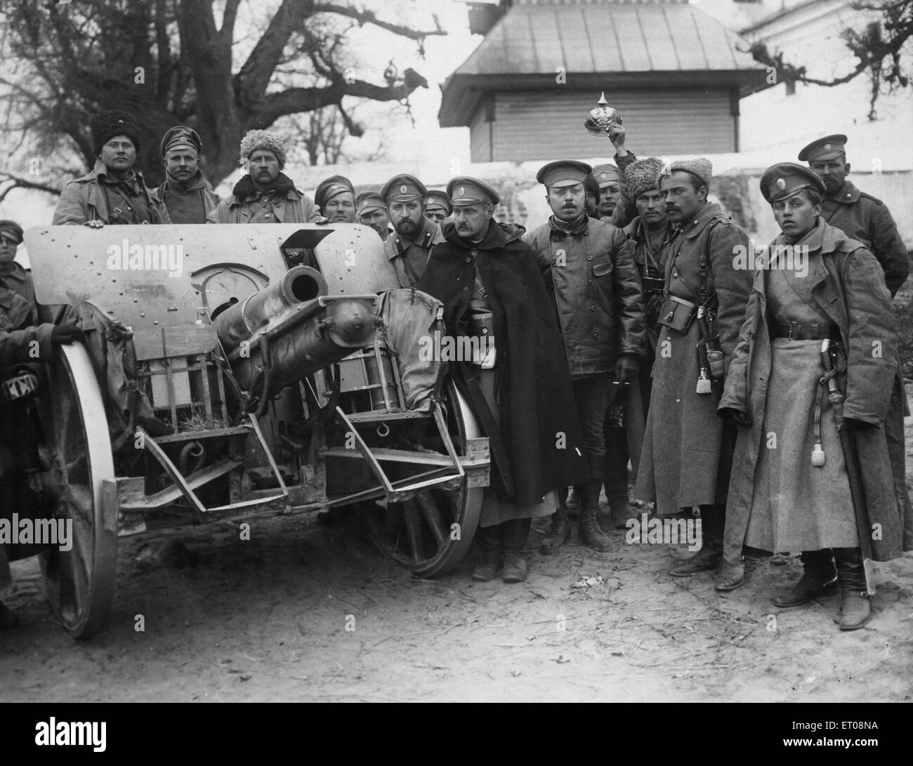 A captured German howitzer taken from the Crown Prince's Koenigsberg Regiment of Grenadiers. In the background is seen the Orthodox Church at Chartorysk Circa September 1914 Stock Photo