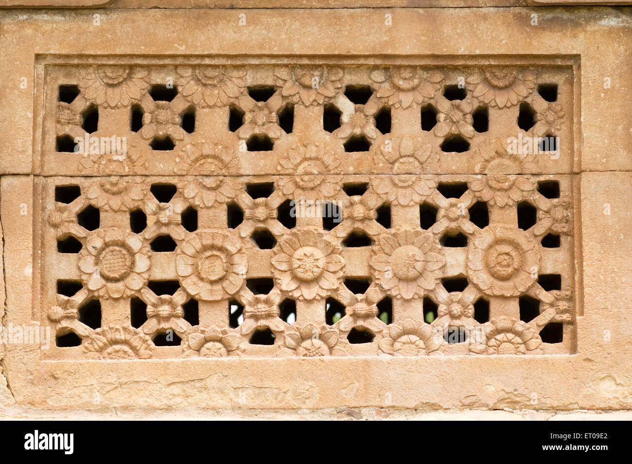 Carved stone windows in Ladkhan temple built in 7th century ; Aihole ; Karnataka ; India Stock Photo
