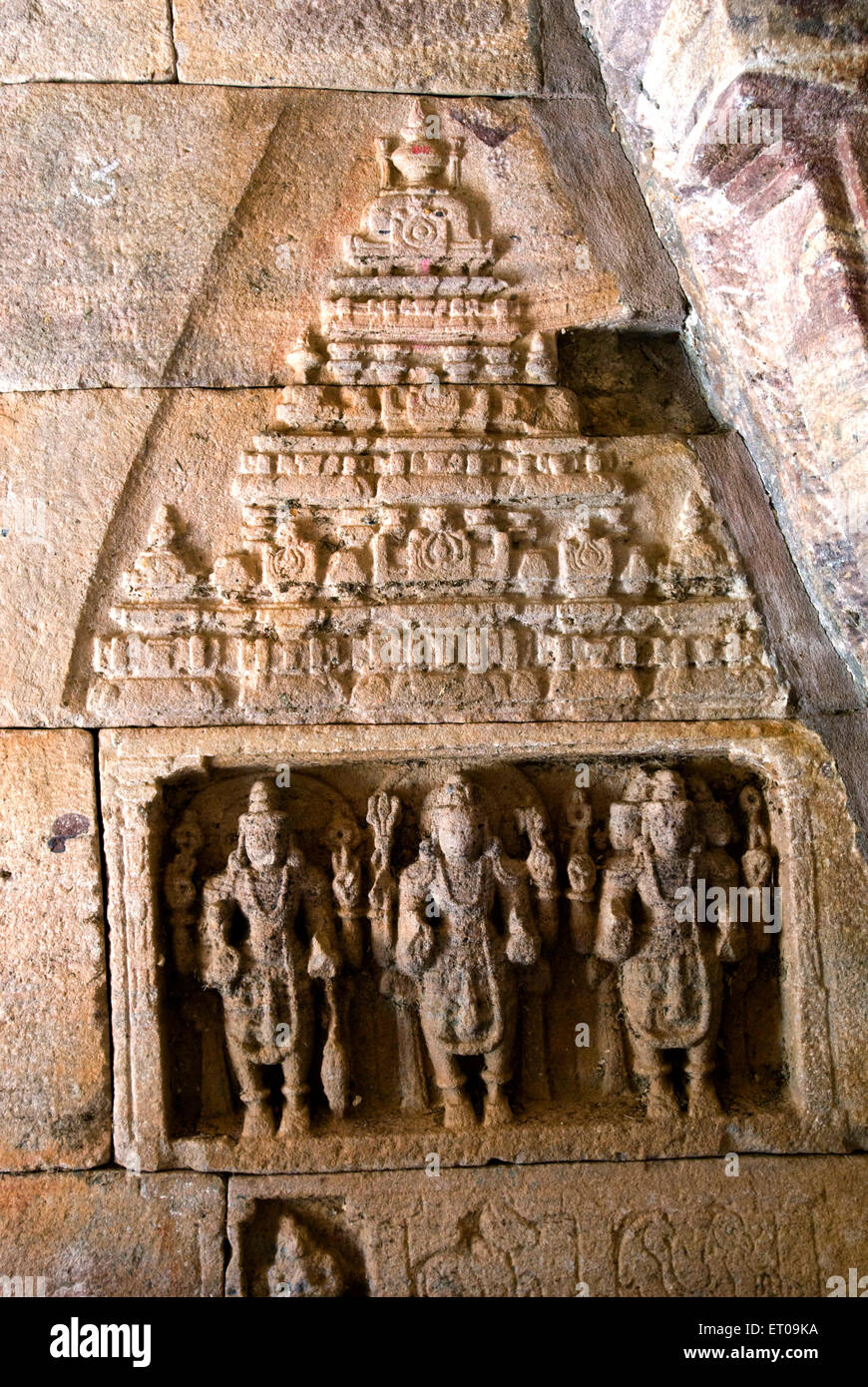 Shiva ; Vishnu and Brahma sculptures in Ananthashayana temple in cave temple 7th century ; Badami ; Karnataka ; India Stock Photo