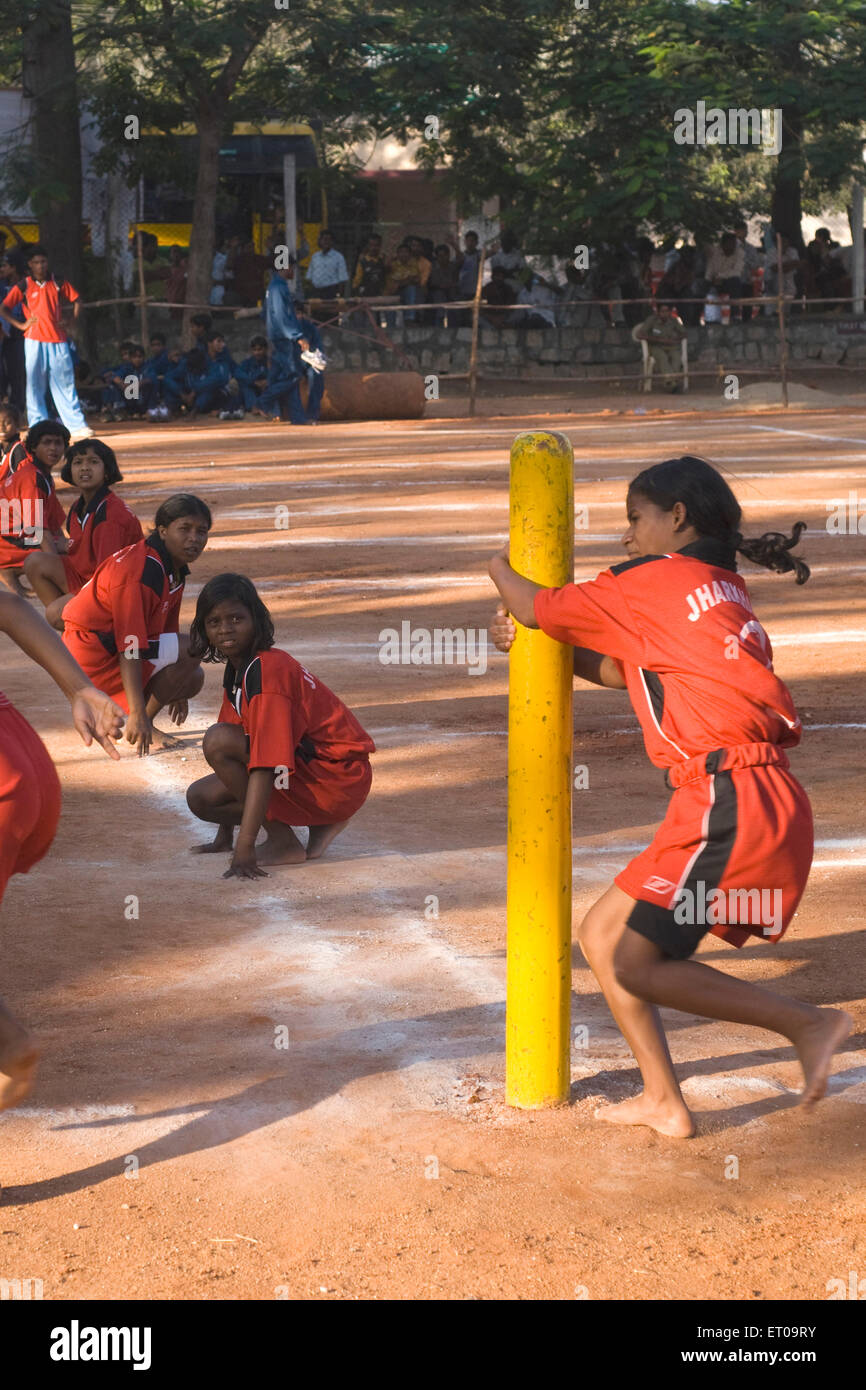 Girls playing Kho Kho, tag game, Coimbatore, Tamil Nadu, India, Asia Stock Photo