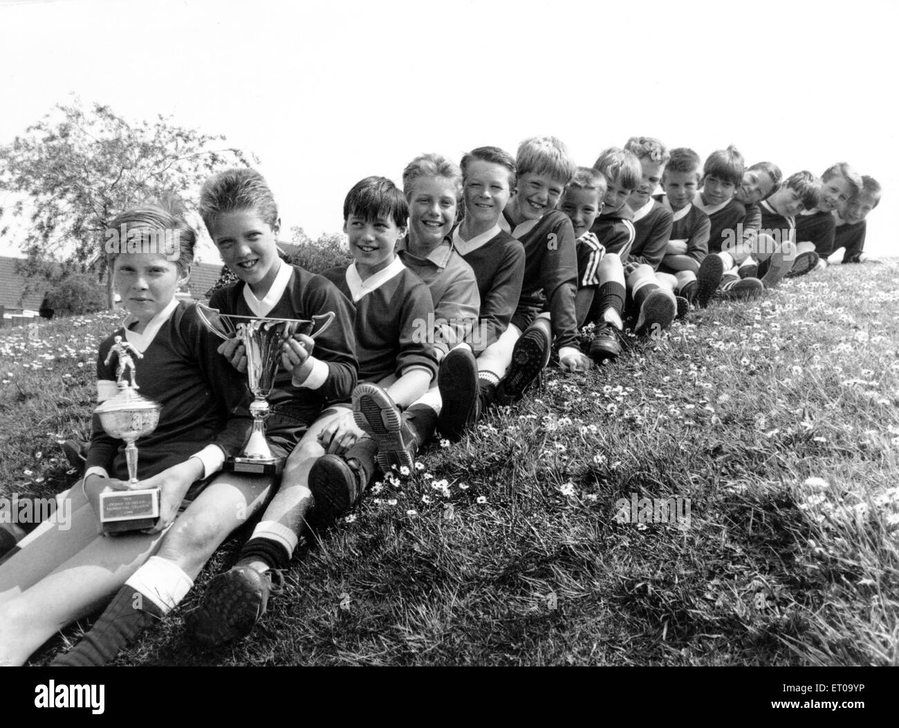 Guisborough's Galley Hill Primary School Under 11's swept the board with a sparkling League and Derek Butler Memorial Trophy double this season. The line-up: Mark Hodgeson, David Asprey, David Spencer, Darren Swinhoe, Ben Senior, Steve Llewellyn, Tim Brown, Mark Hannant, Rob Morris, John Wright, Nick Box, Chris Young, Matthew Bishop, Alex Wills and Chris Williams. 27th May 1989 Stock Photo