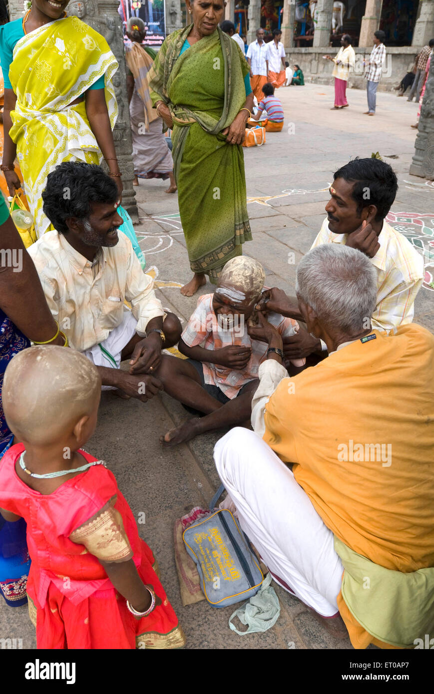 Ear boring ceremony at Thiruvannamalai ; Tamil Nadu ; India Stock Photo