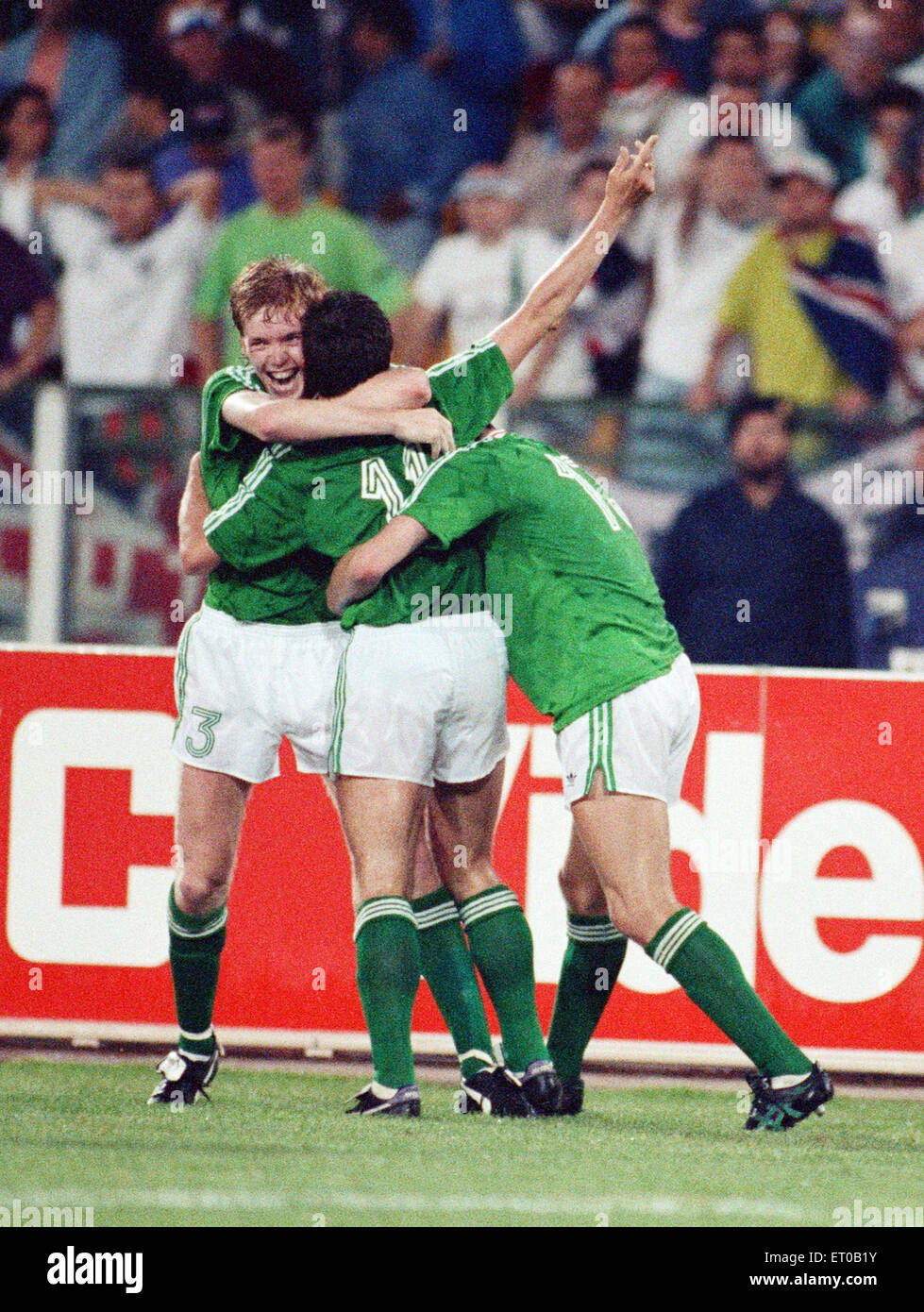 World Cup Group F match at the Stadio Sant'Elia in Cagliari, Italy. England 1 v Republic of Ireland 1. Kevin Sheedy is congratulated by teammates Steve Staunton and ndy Townsend after scoring the equalising goal. 11th June 1990. Stock Photo
